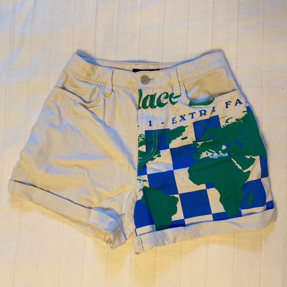 High rise Vans shorts with globe detail